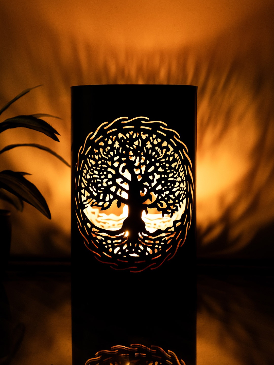 

Ekhasa Black & Gold Toned Textured Cylindrical Metal Candle Holder
