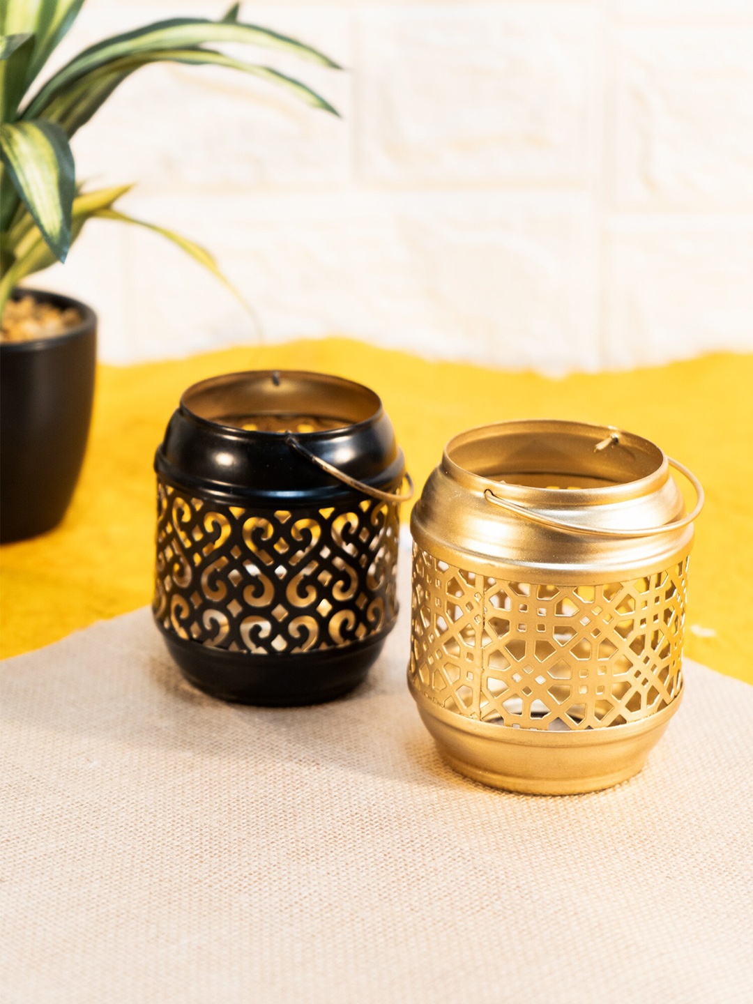 

Ekhasa Gold Toned & Black 2 Pieces Metal Lantren Tealight Candle Holders