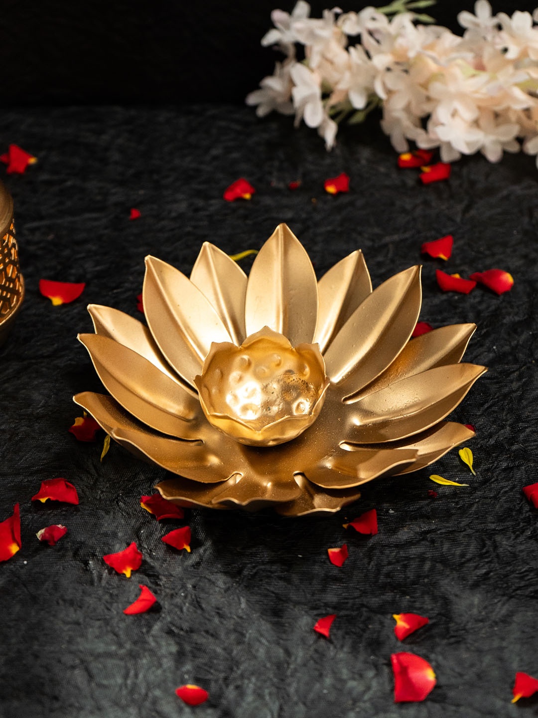 

Ekhasa Gold Toned Metal Lotus Shape Candle Holder