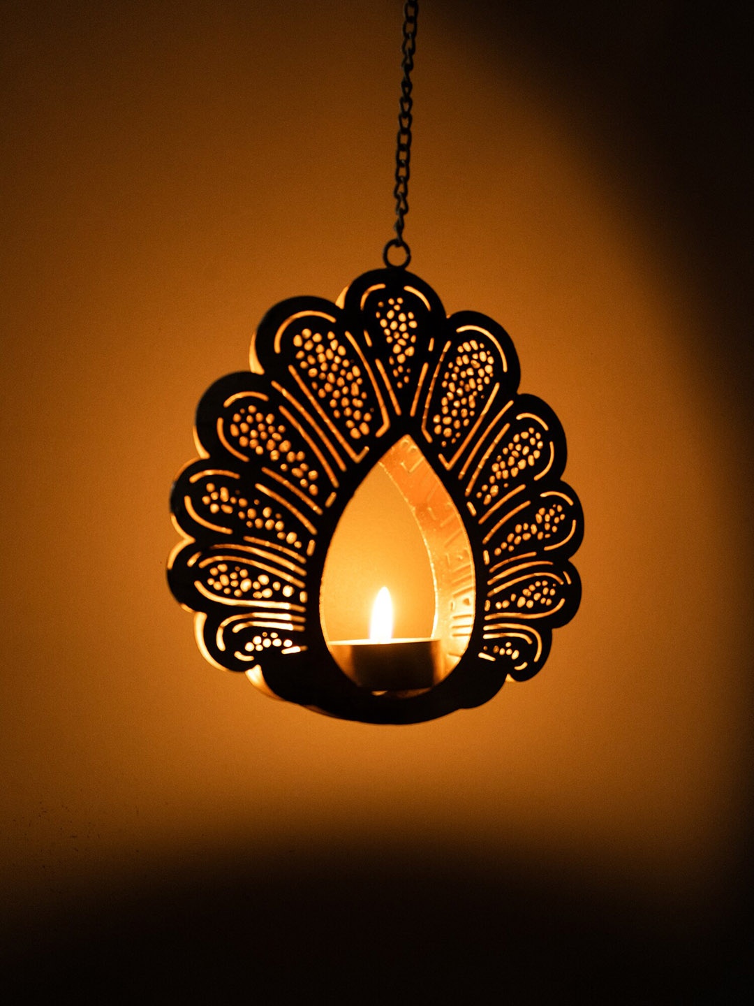 

Ekhasa Gold Toned Metal Hanging Tealight Candle Holder