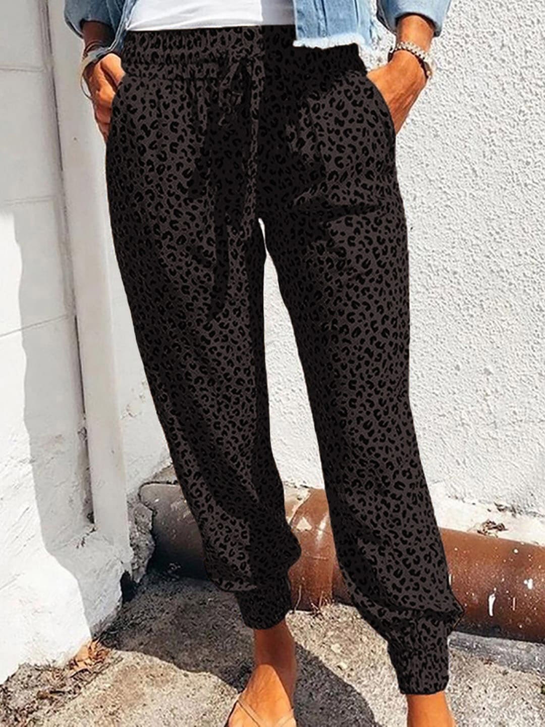 

Stylecast X KPOP Women Brown Regular Fit Mid-Rise Printed Joggers Trousers