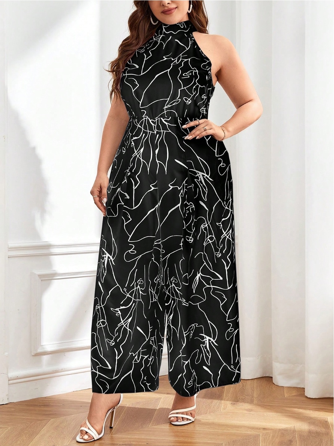 

Stylecast X KPOP Black Printed Sleeveless Jumpsuit