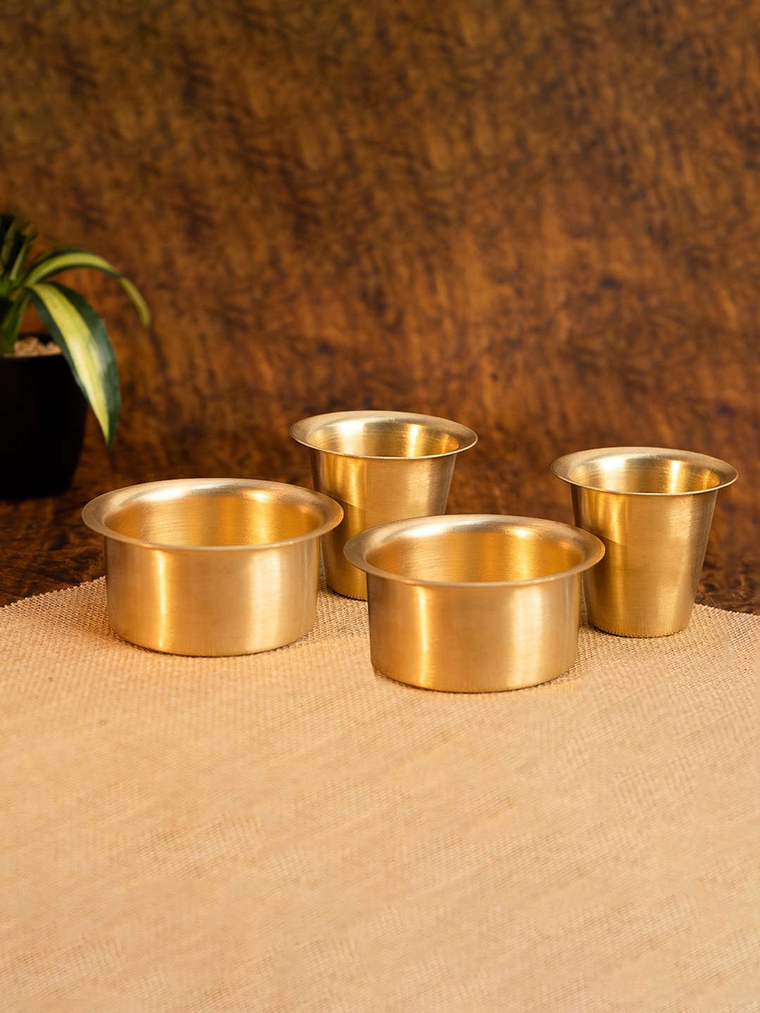 

Ekhasa Gold-Toned 4 Pieces Brass Glossy Cups & Saucers Set 130 ml Each