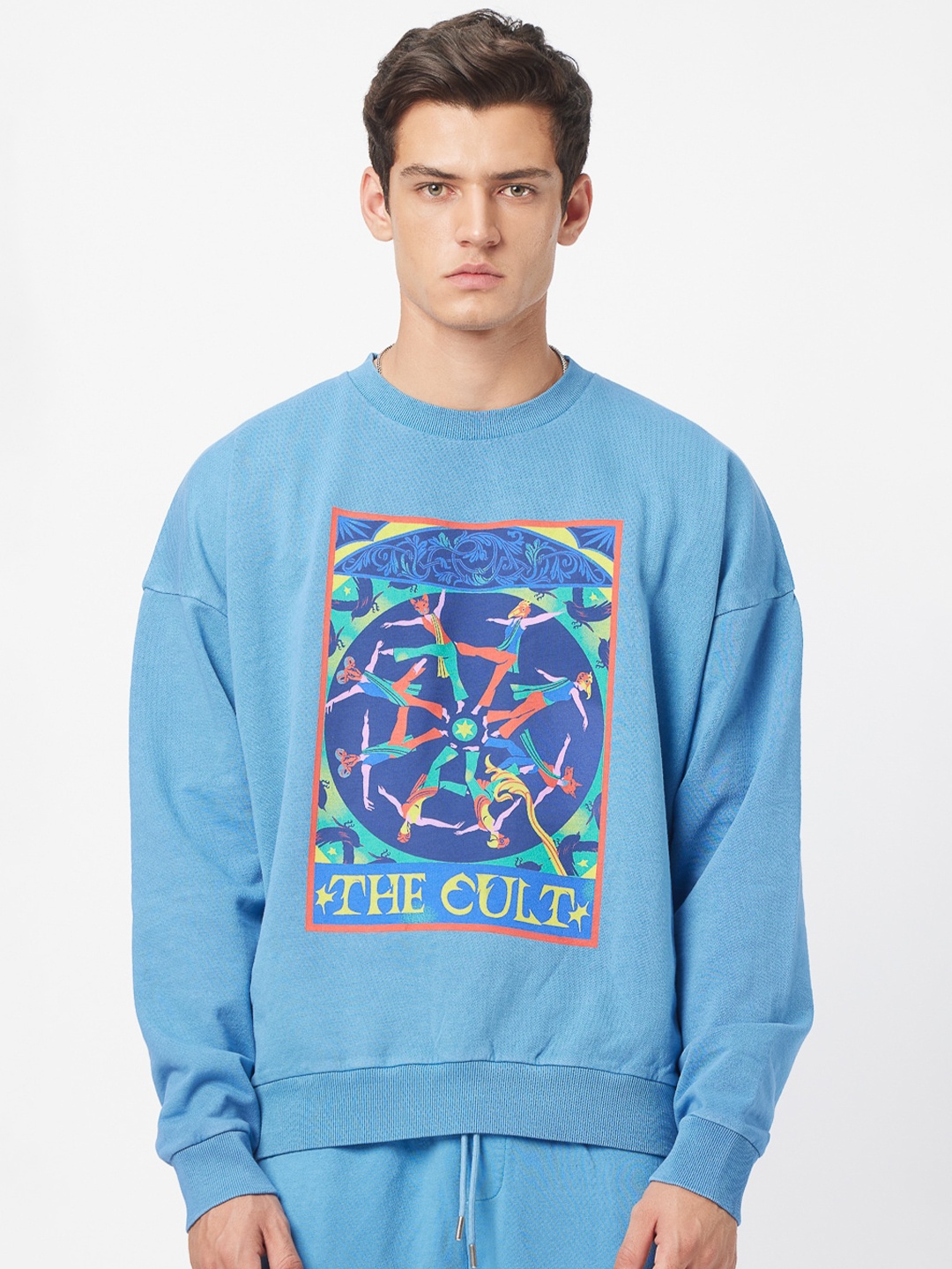 

Koovs Graphic Printed Cotton Straight Pullover Sweatshirt, Blue