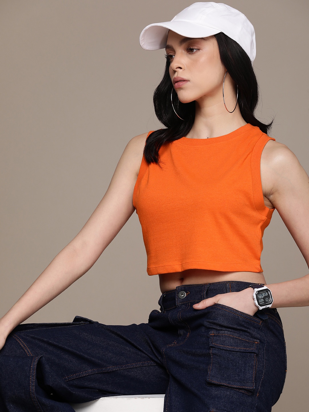 

The Roadster Lifestyle Co. Women Solid Crop T-shirt, Orange