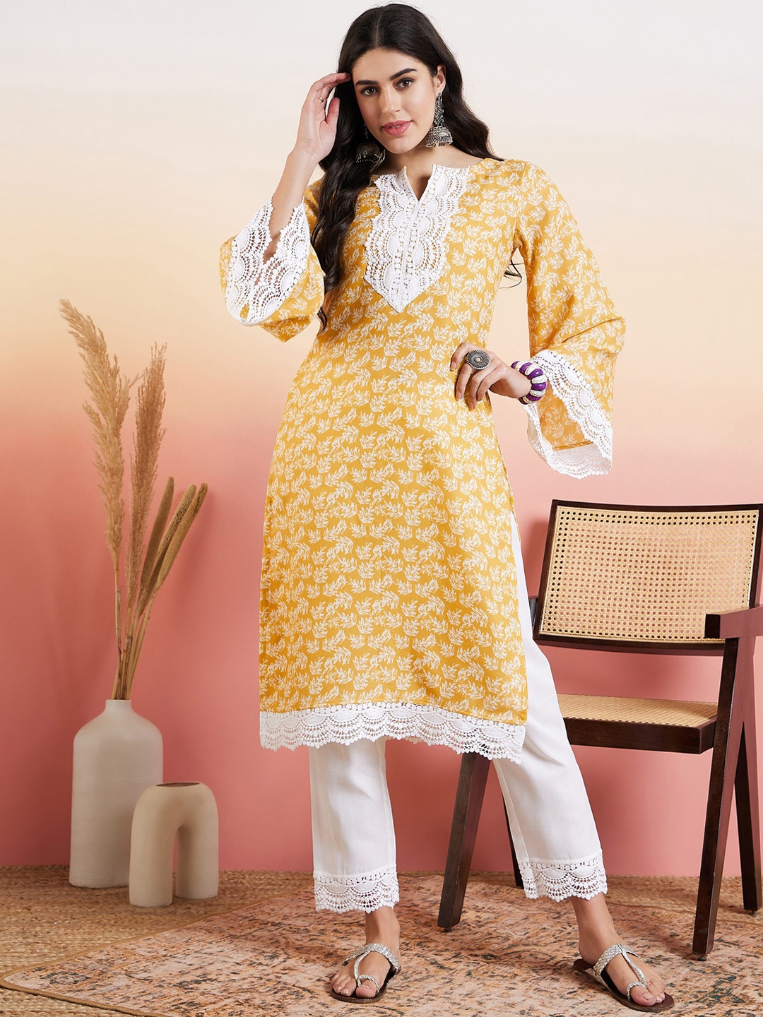 

Inddus Floral Printed Thread Work Straight Kurta, Mustard