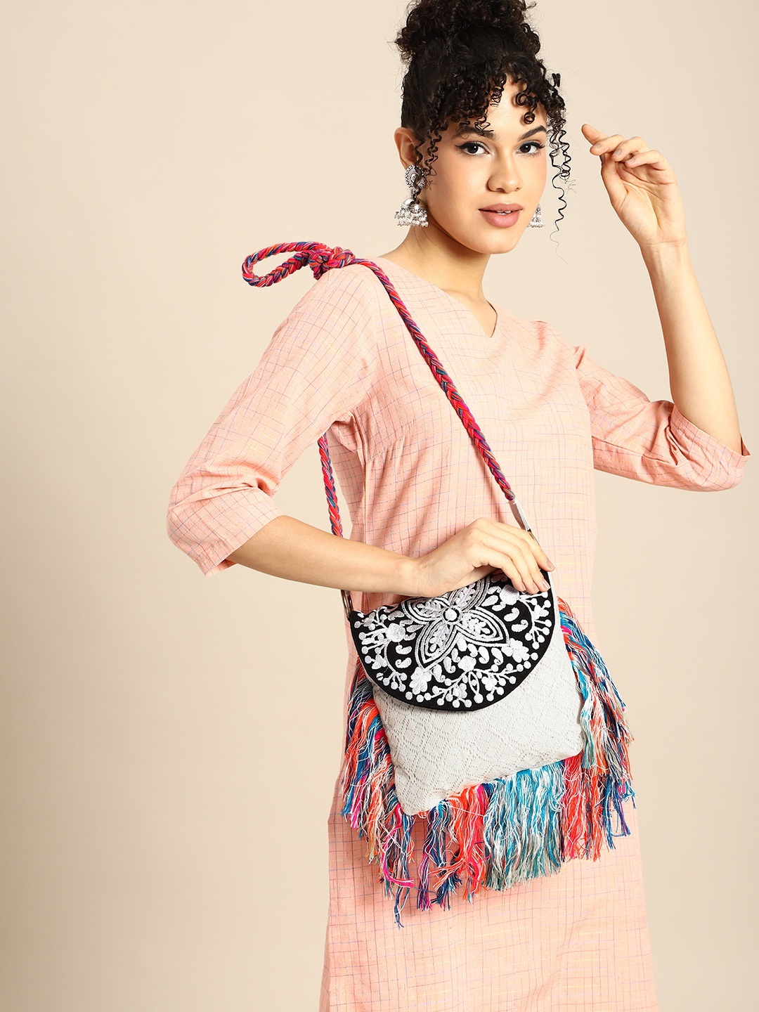 

Sangria Ethnic Motifs Printed Structured Sling Bag with Tasselled, Multi