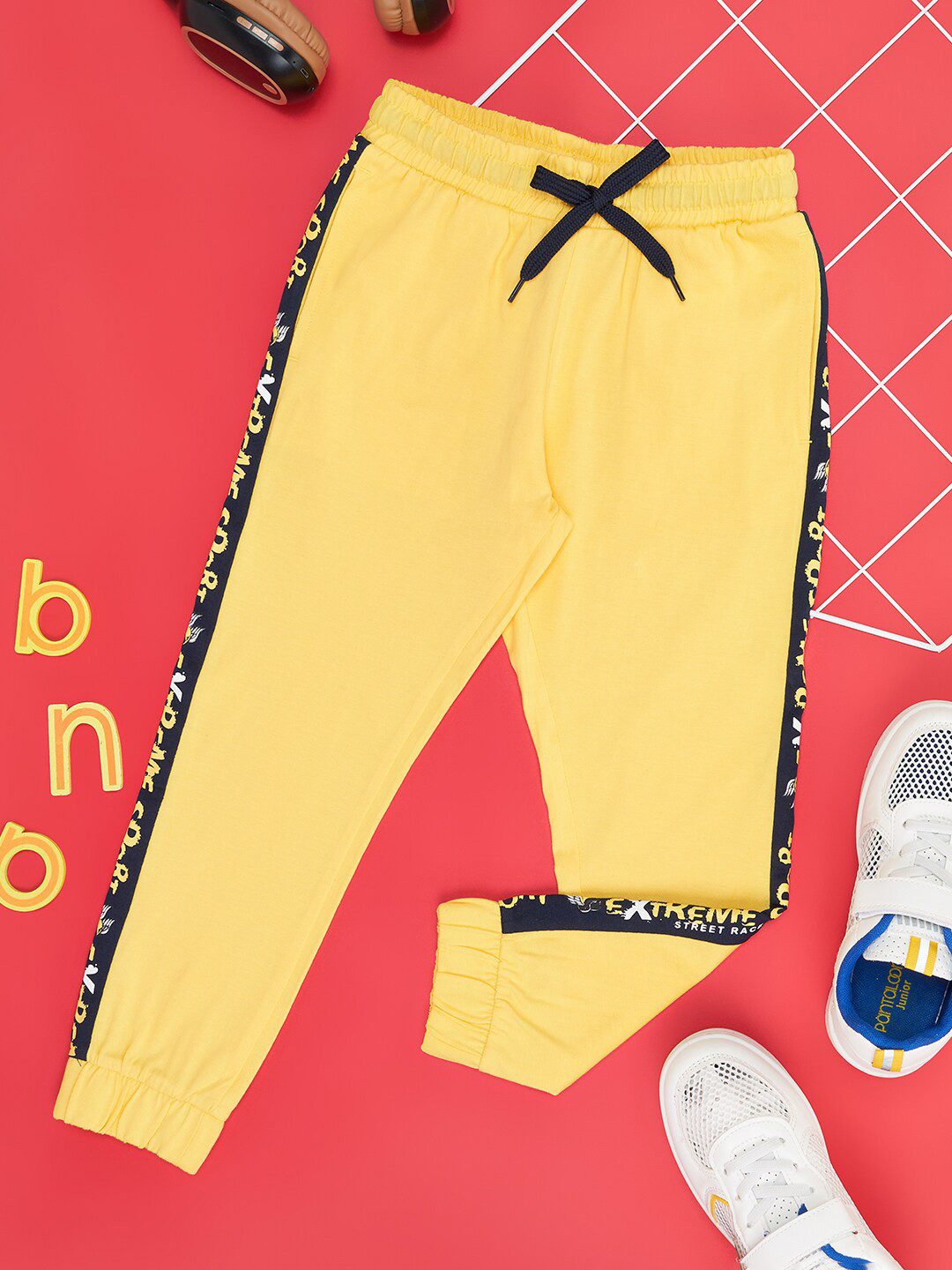 

Pantaloons Junior Boys Typography Printed Cotton Joggers, Yellow