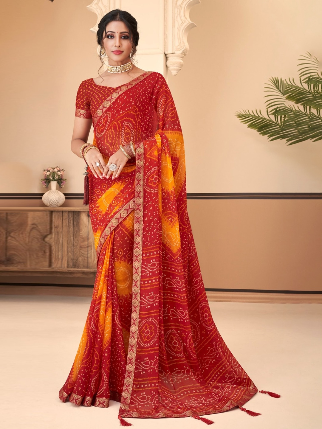 

Reboot Fashions Bandhani Printed Gotta Patti Pure Chiffon Saree, Red
