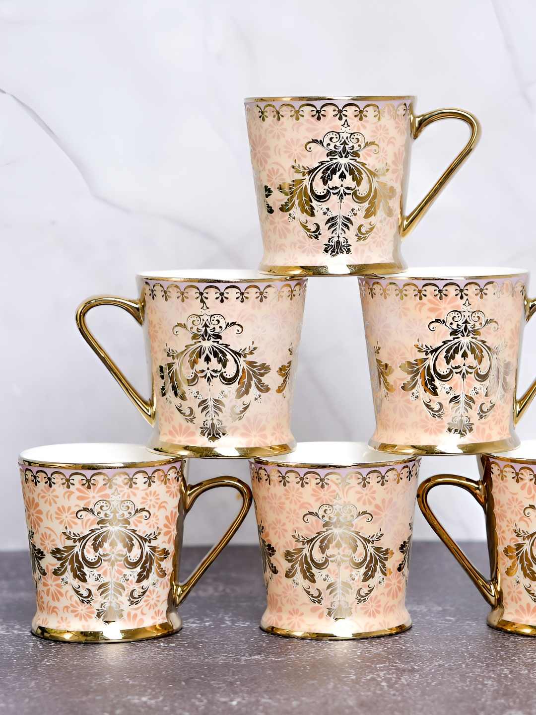 

Femora 6 Pieces Gold-Toned & Beige Ethnic Motifs Printed Ceramic Glossy Mugs
