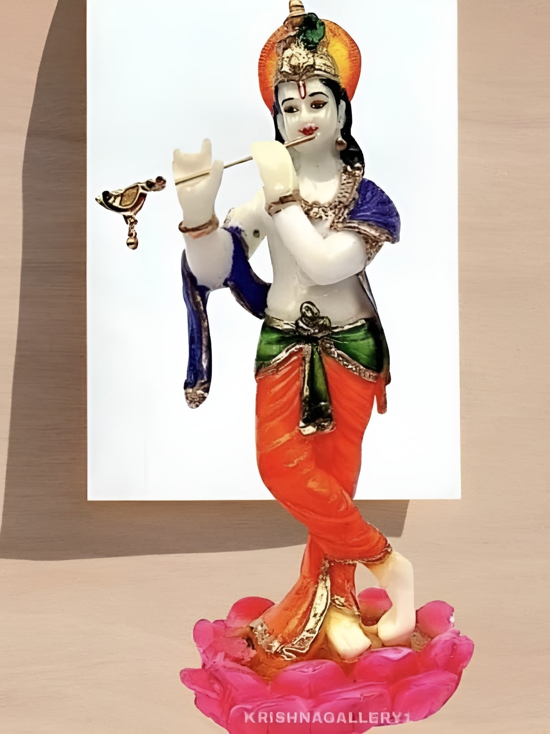 

krishnagallery1 White & Orange Lord Krishna Idol Showpiece