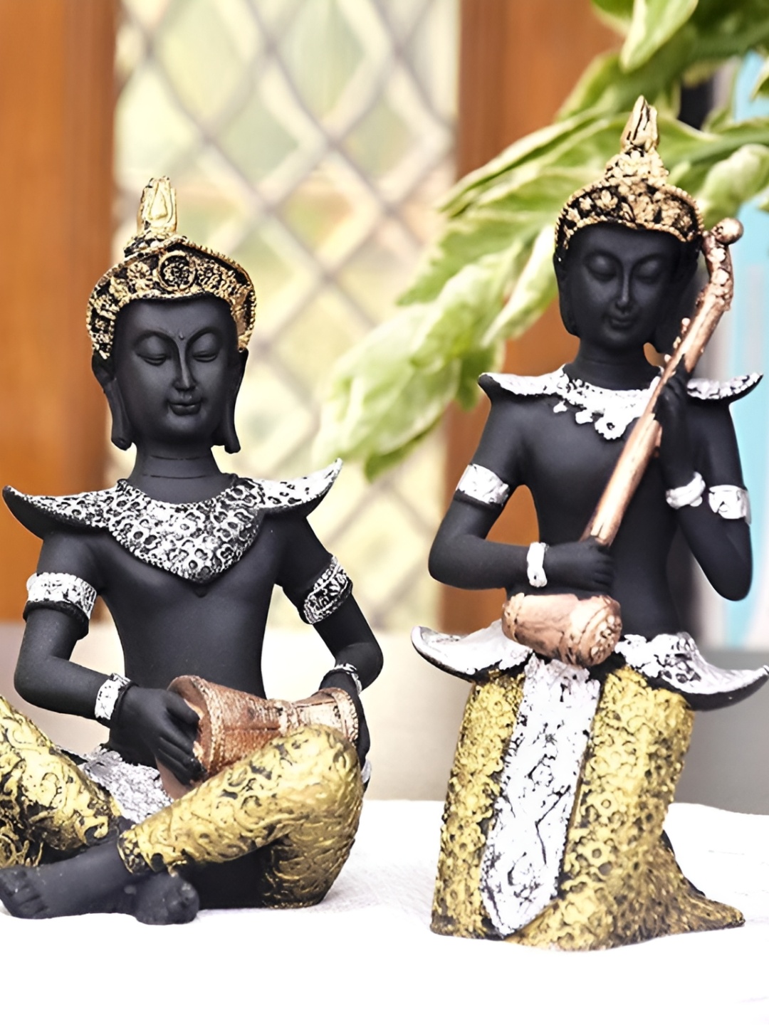 

krishnagallery1 Black & Silver Toned Decorative Idol Showpiece