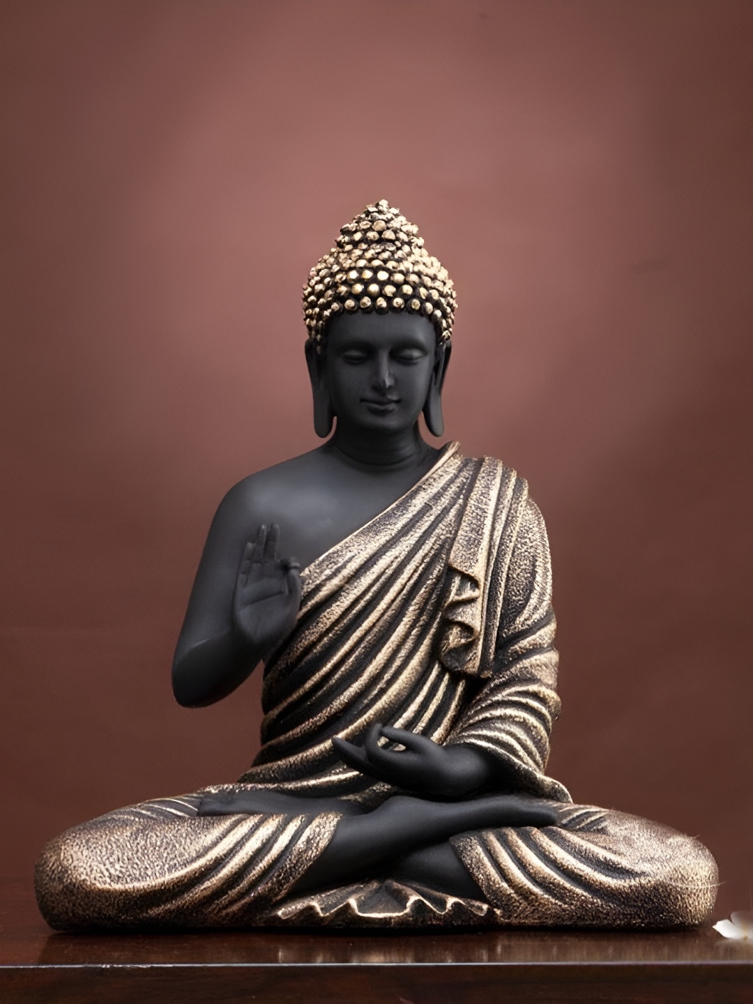 

krishnagallery1 Black & Gold Toned Buddha Idol Showpiece