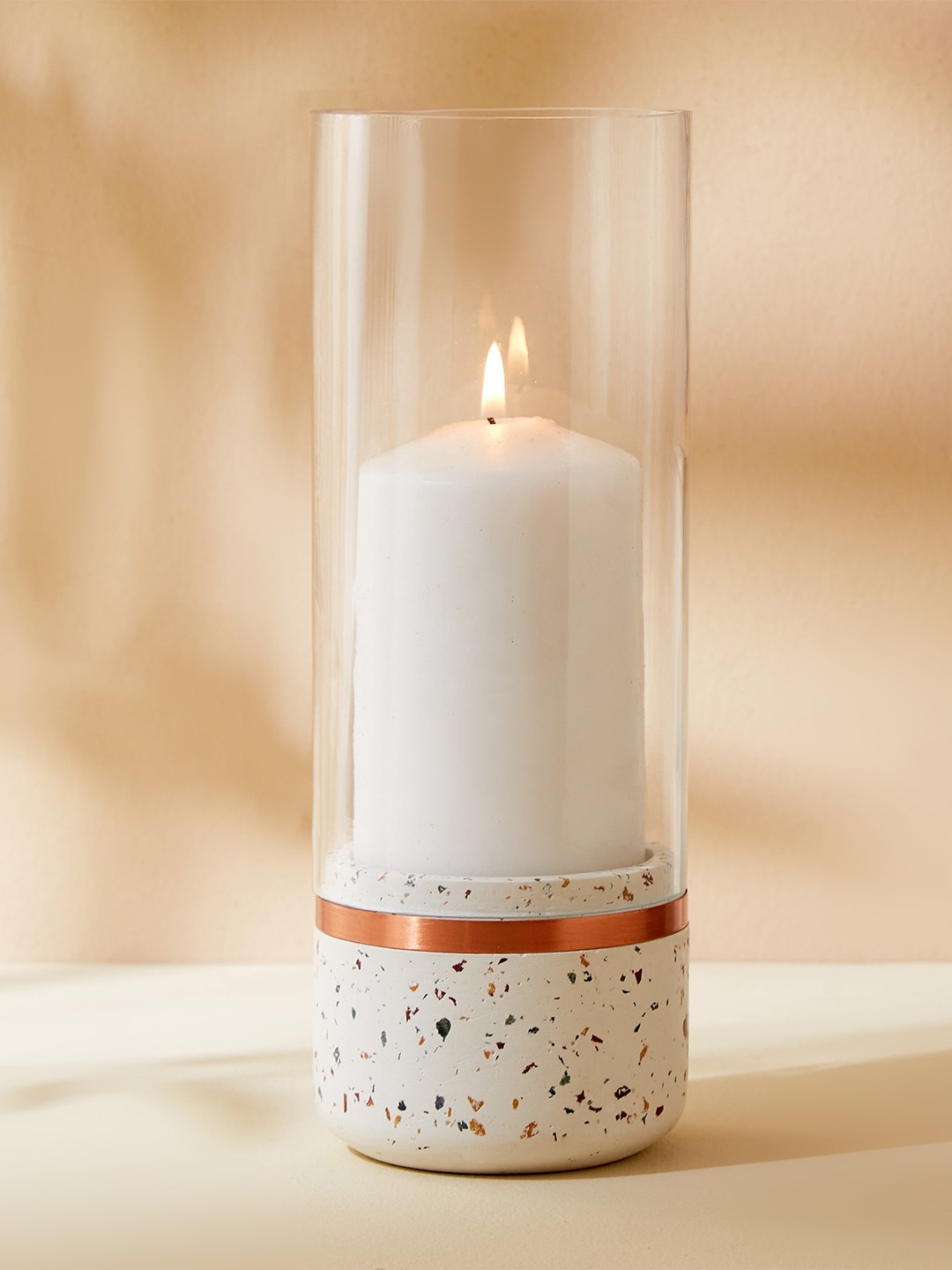 

Home Centre White Glass Candle Holder