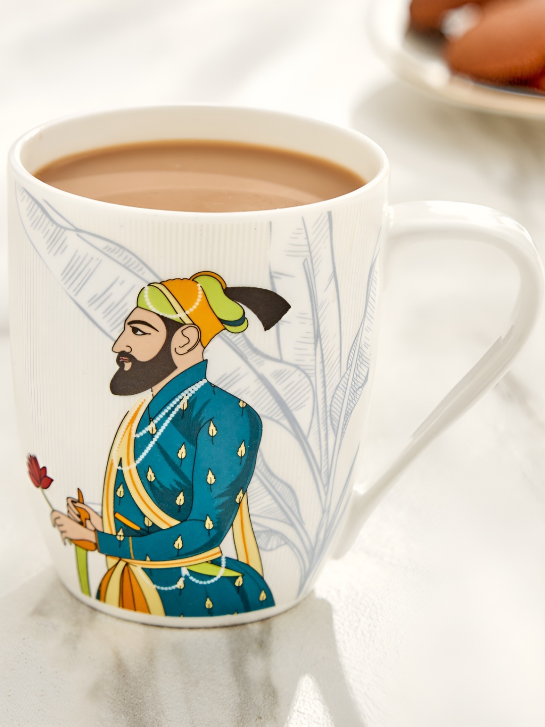 

Home Centre White & Blue Printed Bone China Matte Mug 350 ML
