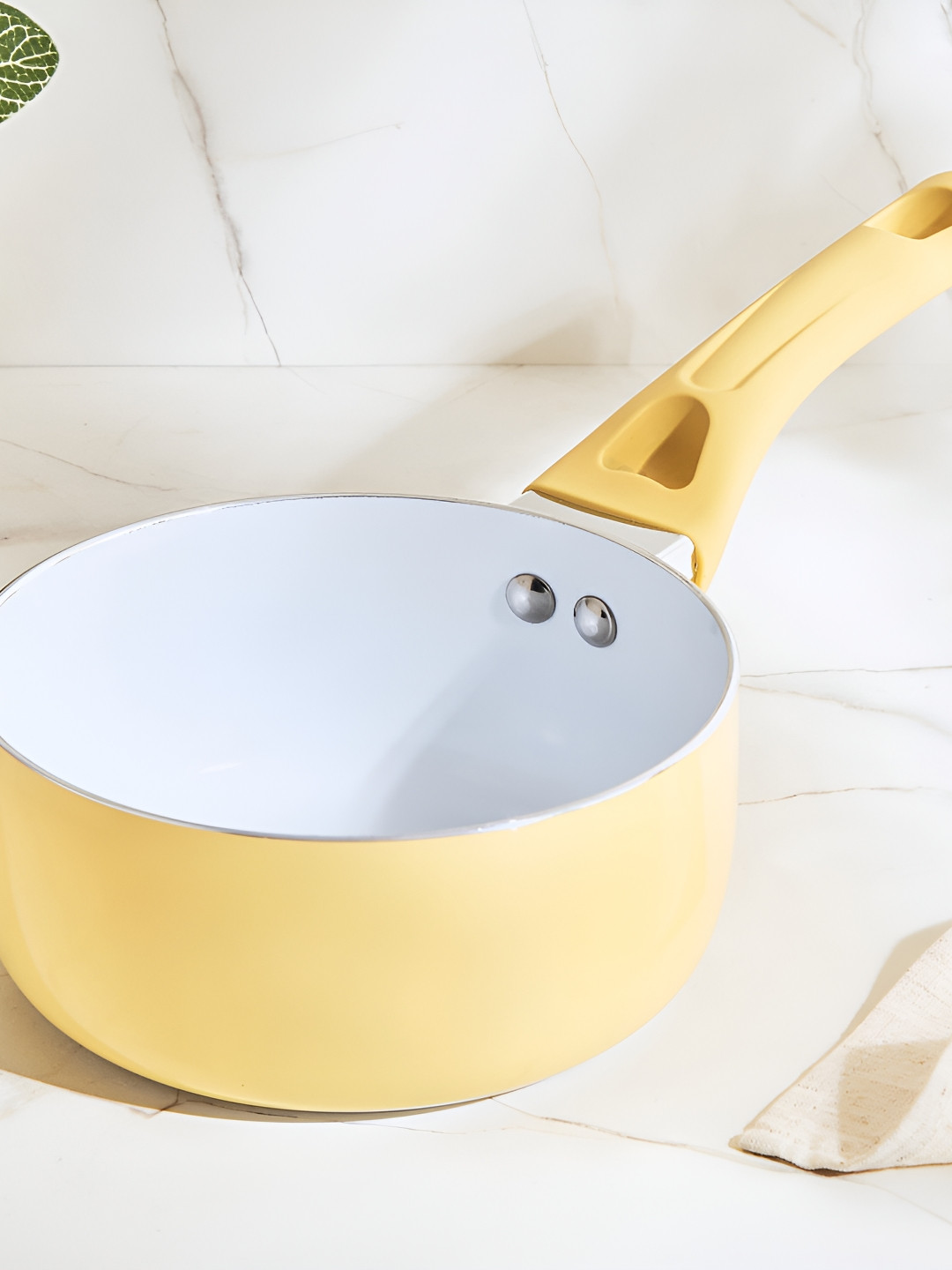 

Home Centre Yellow & White Aluminium Sauce Pan 1.2 L