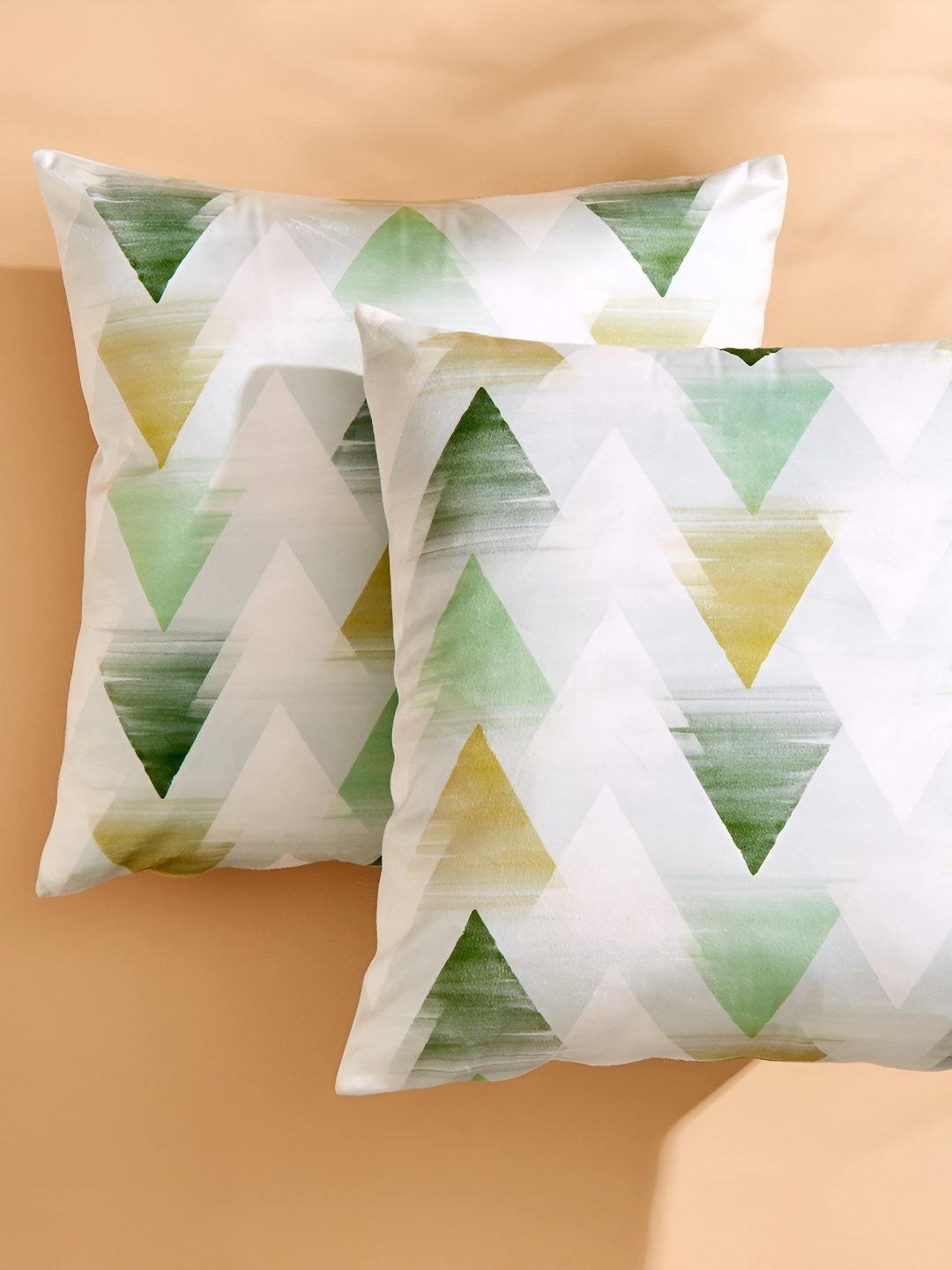 

Home Centre Evan Sesame White & Green 2 Pieces Geometric Square Cushion Covers