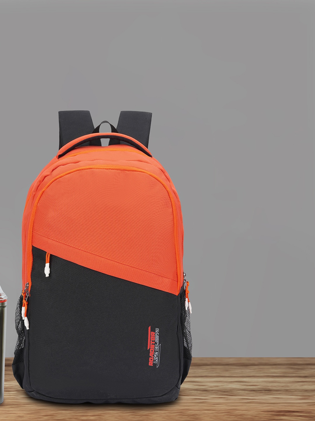 

The Roadster Lifestyle Co. Orange Laptop Waterproof Backpacks