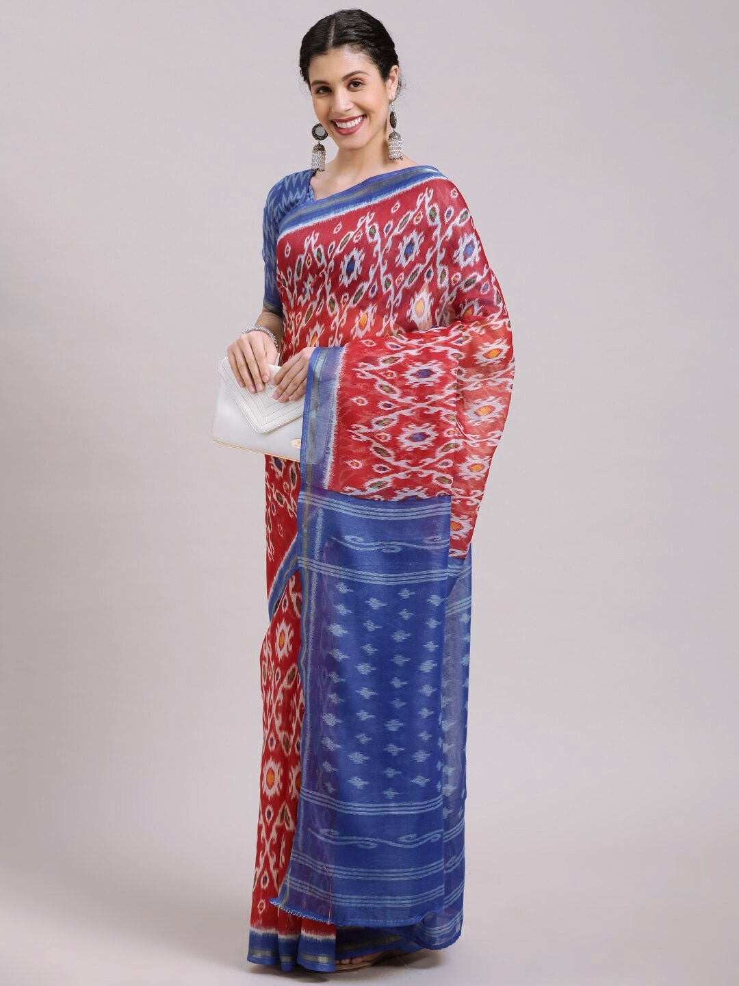 

HRITIKA Red and Blue Ethnic Motifs Printed Ikat Sarees