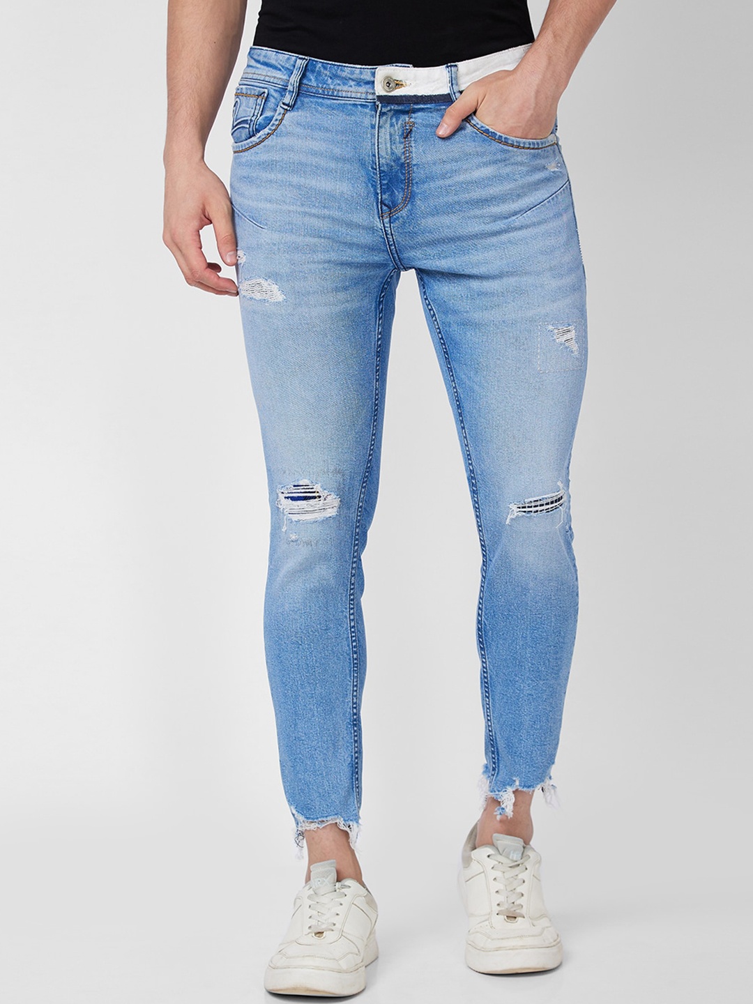 

SPYKAR Men Tapered Fit Mildly Distressed Heavy Fade Cotton Jeans, Blue