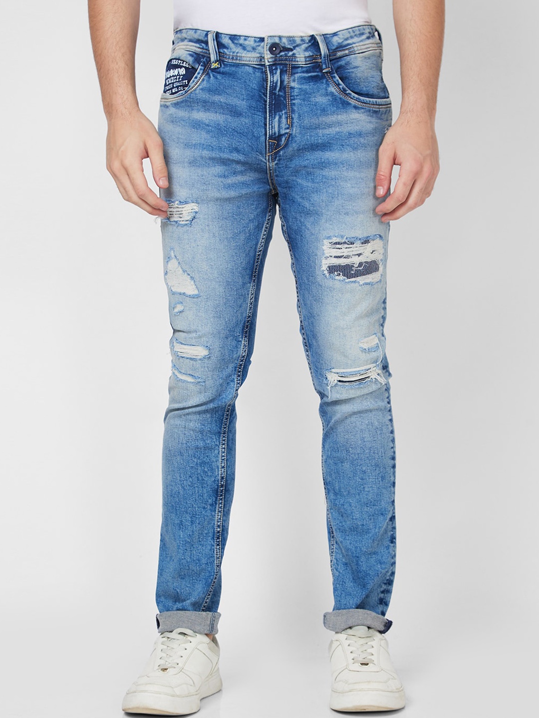 

SPYKAR Men Skinny Fit Low-Rise Highly Distressed Heavy Fade Stretchable Cotton Jeans, Blue