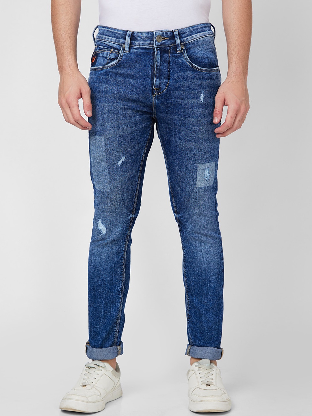 

SPYKAR Men Tapered Fit Mid-Rise Mildly Distressed Heavy Fade Stretchable Jeans, Blue