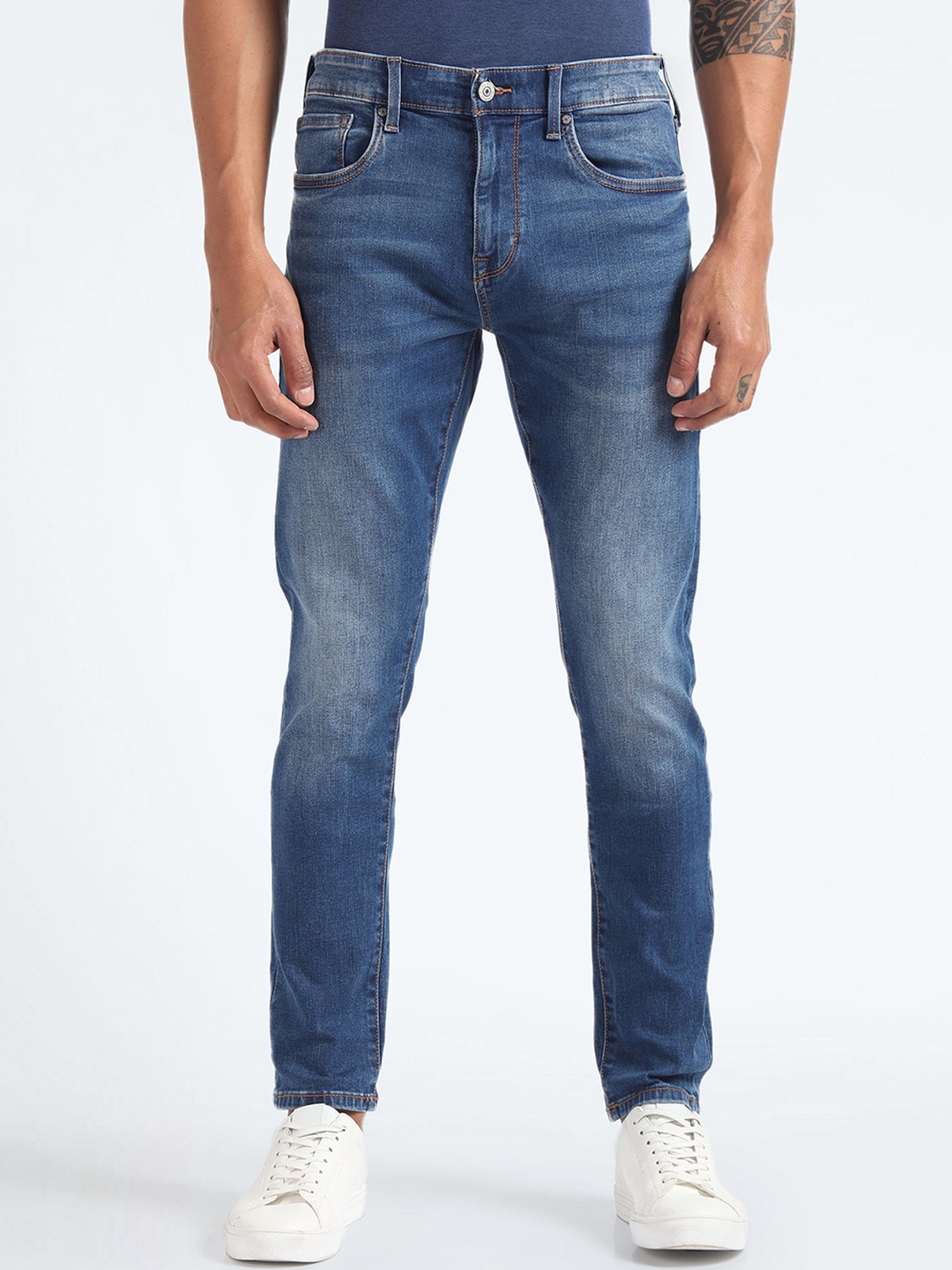 

Flying Machine Men Tapered Fit Light Fade Clean Look Stretchable Jeans, Blue
