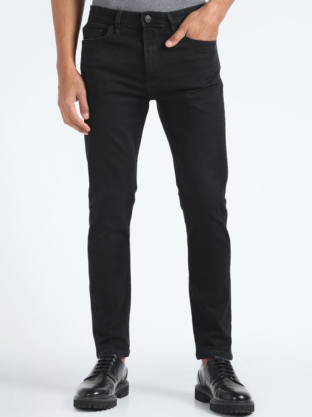 

Flying Machine Men Tapered Fit Clean Look Stretchable Jeans, Black