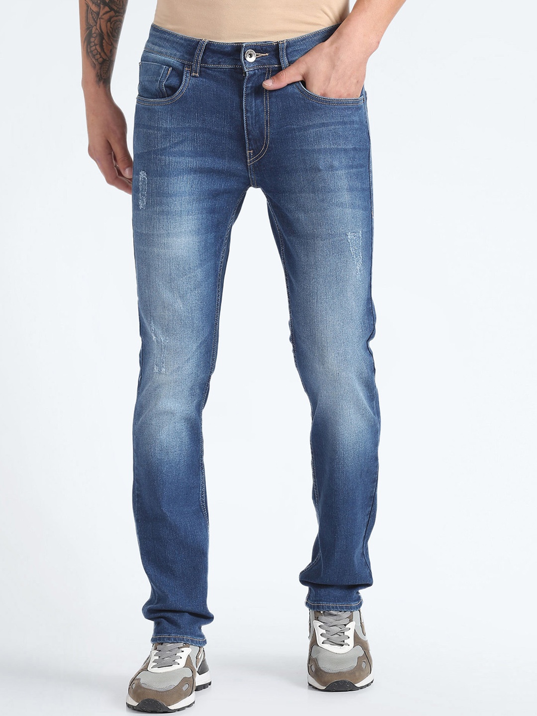 

Flying Machine Men Tapered Fit Mid-Rise Heavy Fade Stretchable Jeans, Blue