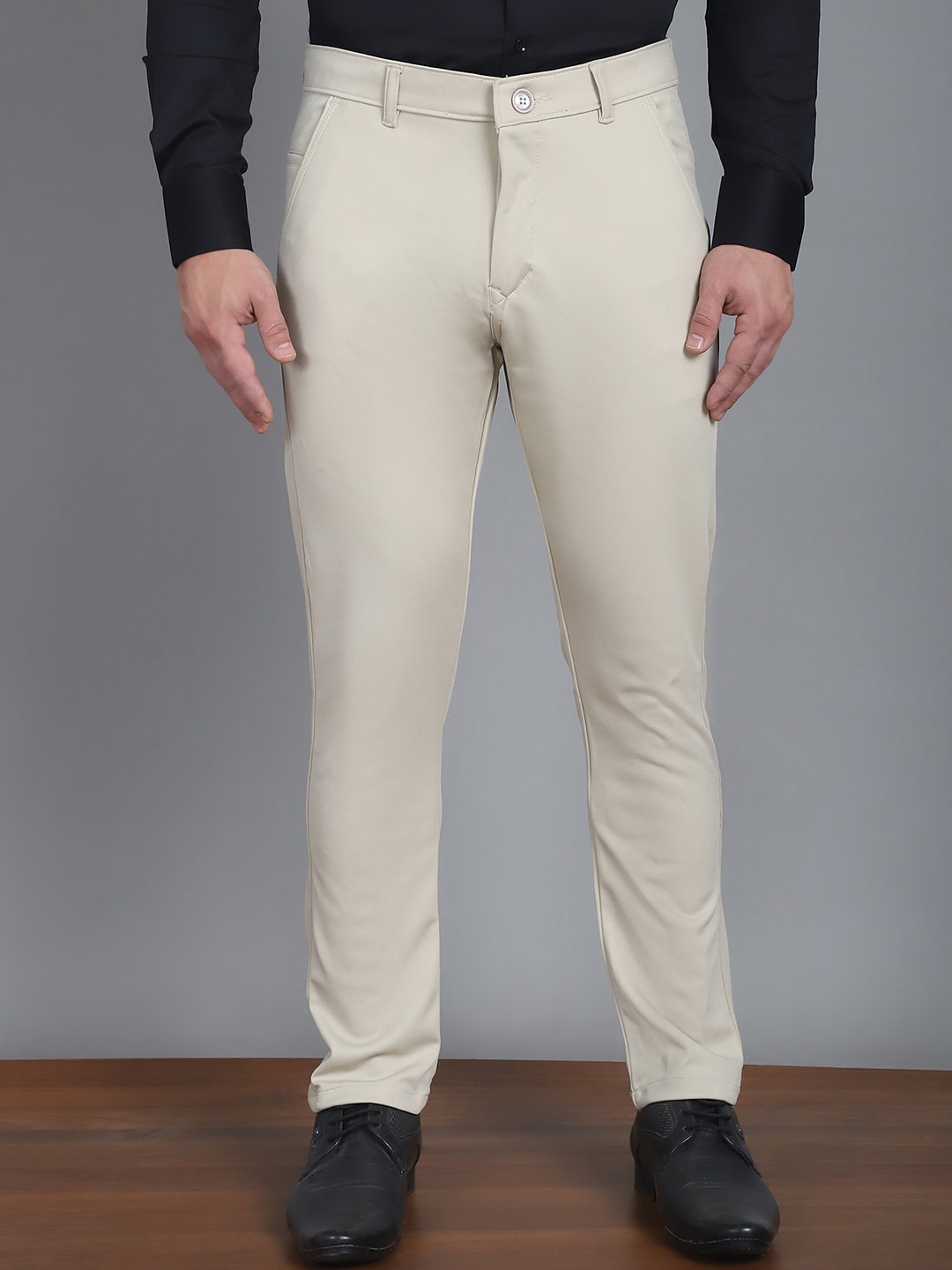 

Indian Needle Men Cotton Relaxed Tapered Fit Easy Wash Trousers, Cream
