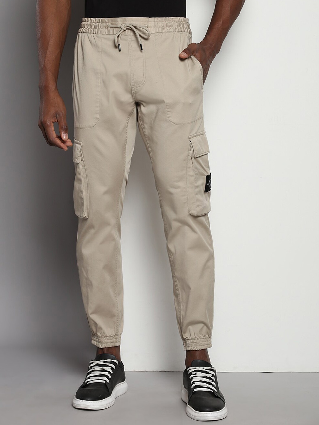 

Calvin Klein Jeans Men Mid-Rise Joggers, Beige