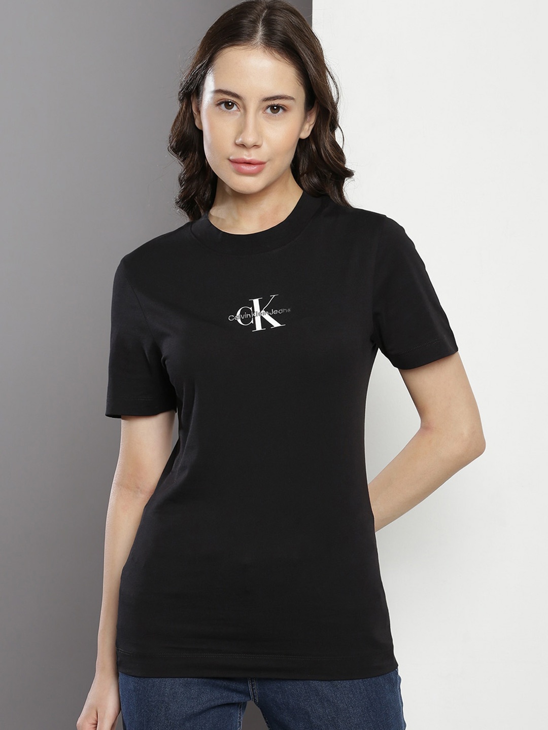 

Calvin Klein Brand Logo Print Cotton Round Neck Pockets T-shirt, Black