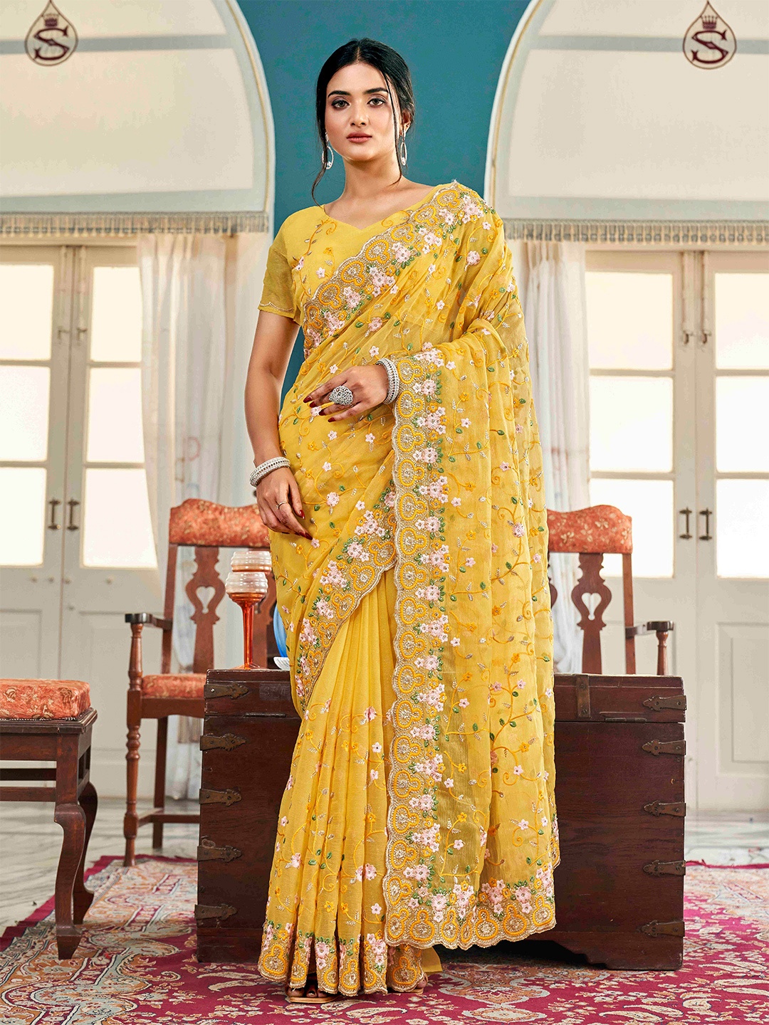 

Tikhi Imli Yellow Ethnic Motifs Beads and Stones Embroidered Saree