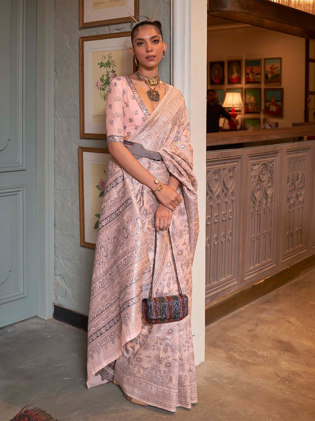 

Mitera Peach & Grey Ethnic Motifs Saree