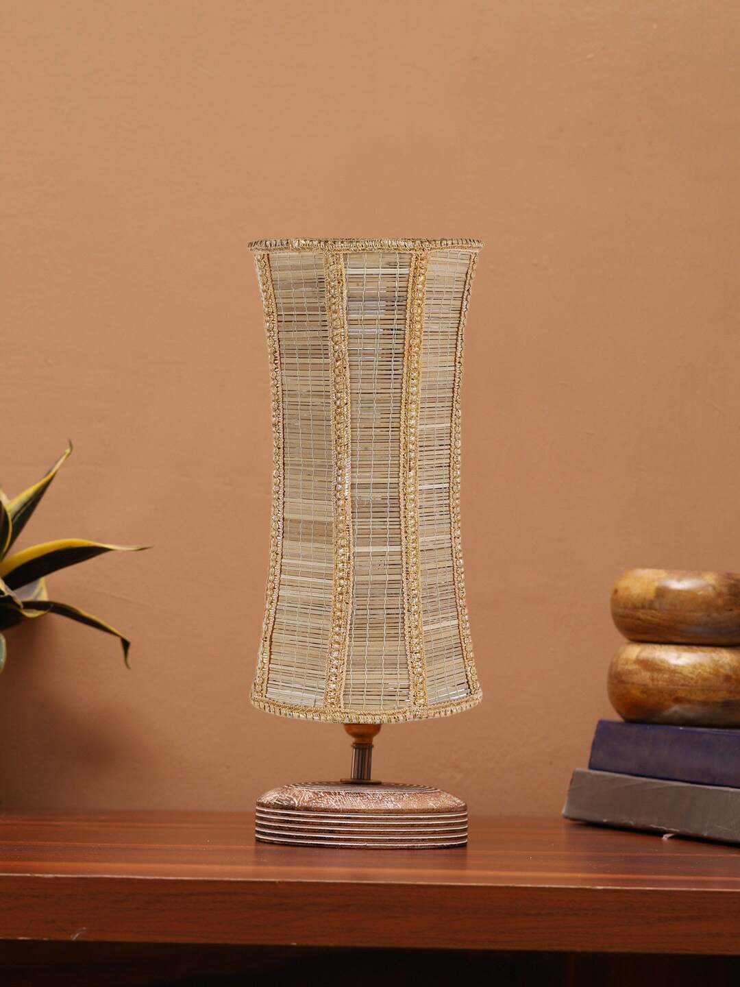 

Devansh Beige Textured Contemporary Abstract Shaped Wooden Table Lamp