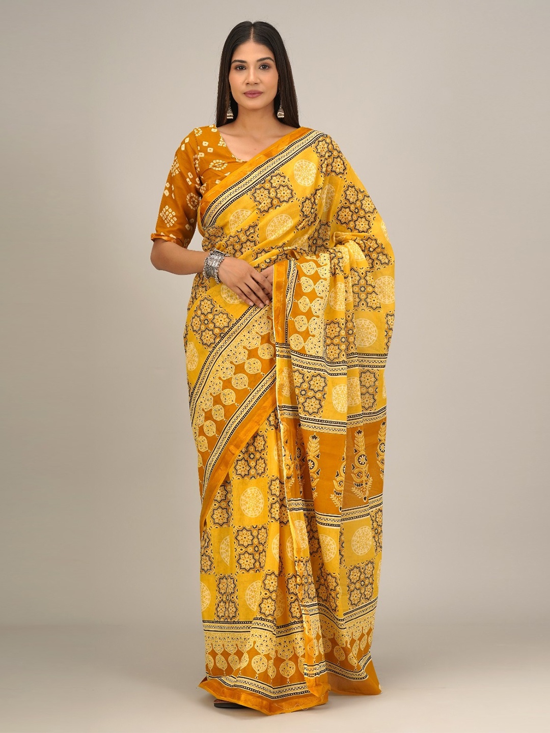 

TROPWEAR Ethnic Motifs Zari Pure Cotton Block Print Saree, Yellow