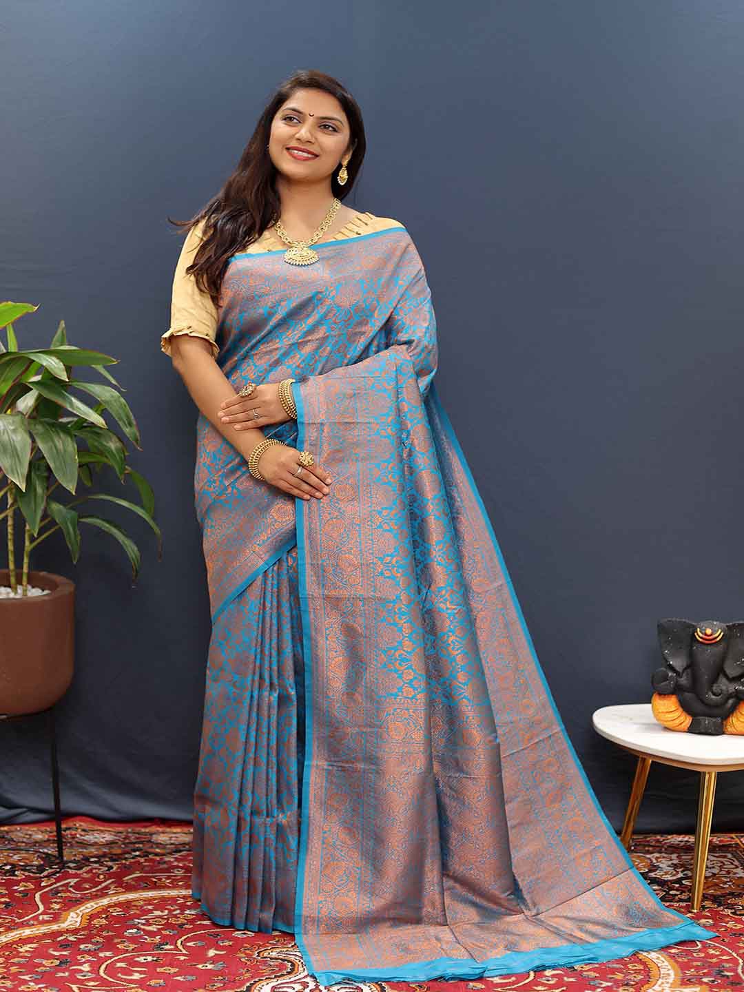 

KALINI Floral Woven Design Zari Saree, Blue