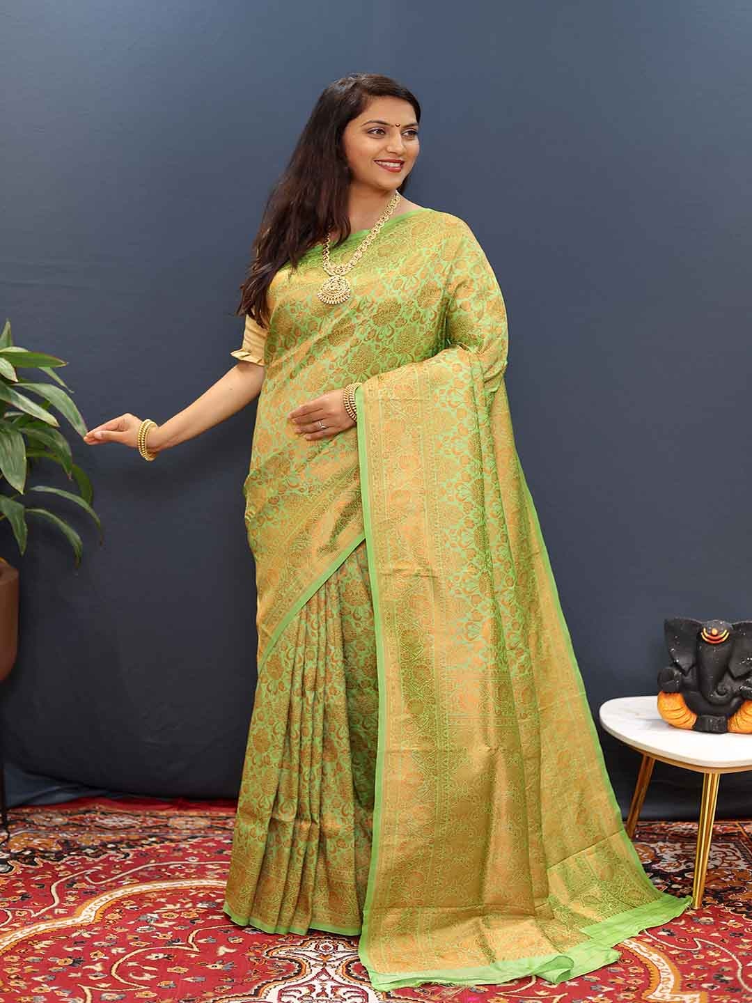 

KALINI Ethnic Motifs Woven Design Zari Detailed Saree, Green