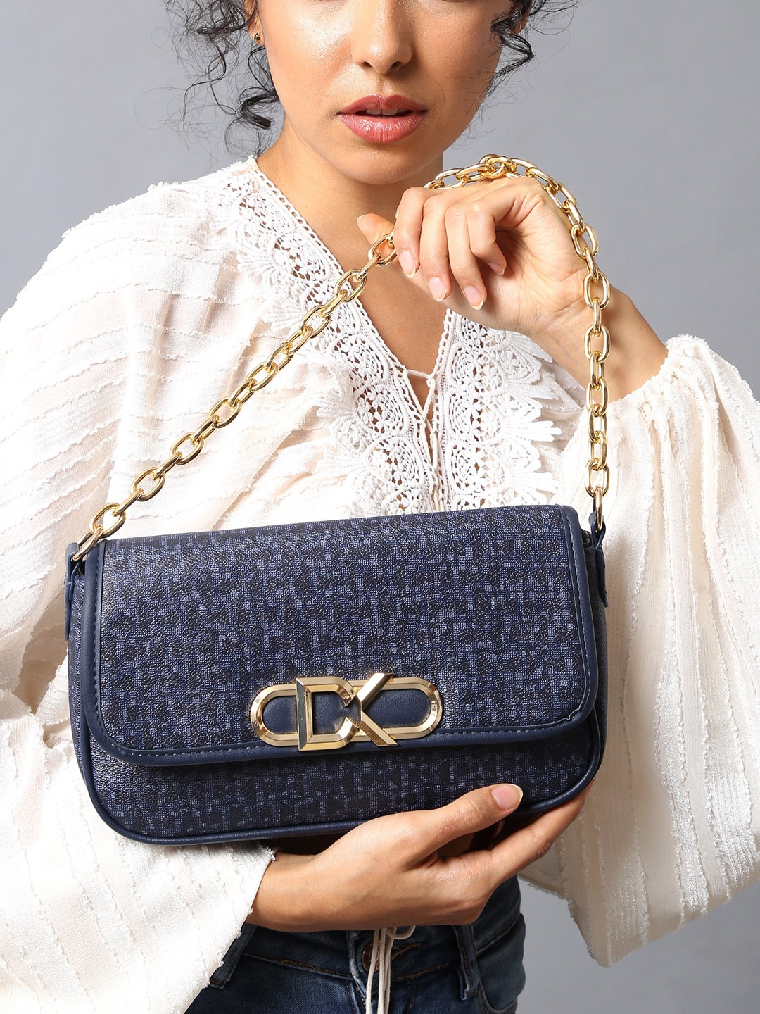 

Diana Korr Abstract Printed Structured Sling Bag, Navy blue