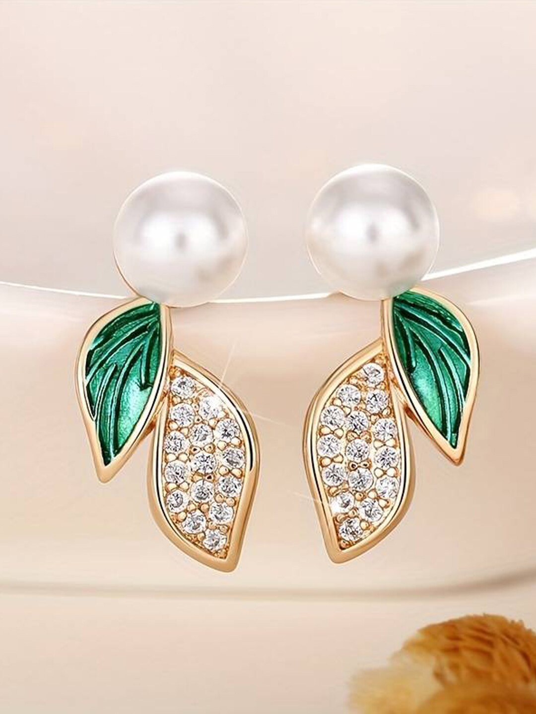 

Krelin Gold-Plated Leaf Shaped Studs Earrings