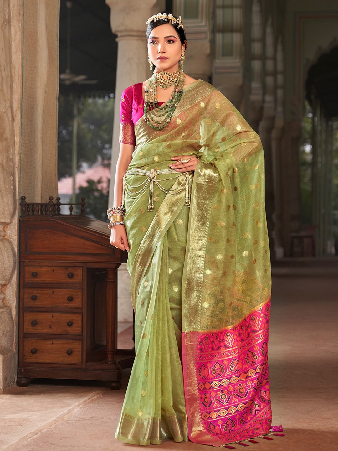 

Satrani Green & Pink Ethnic Motifs Woven Design Zari Silk Cotton Banarasi Saree