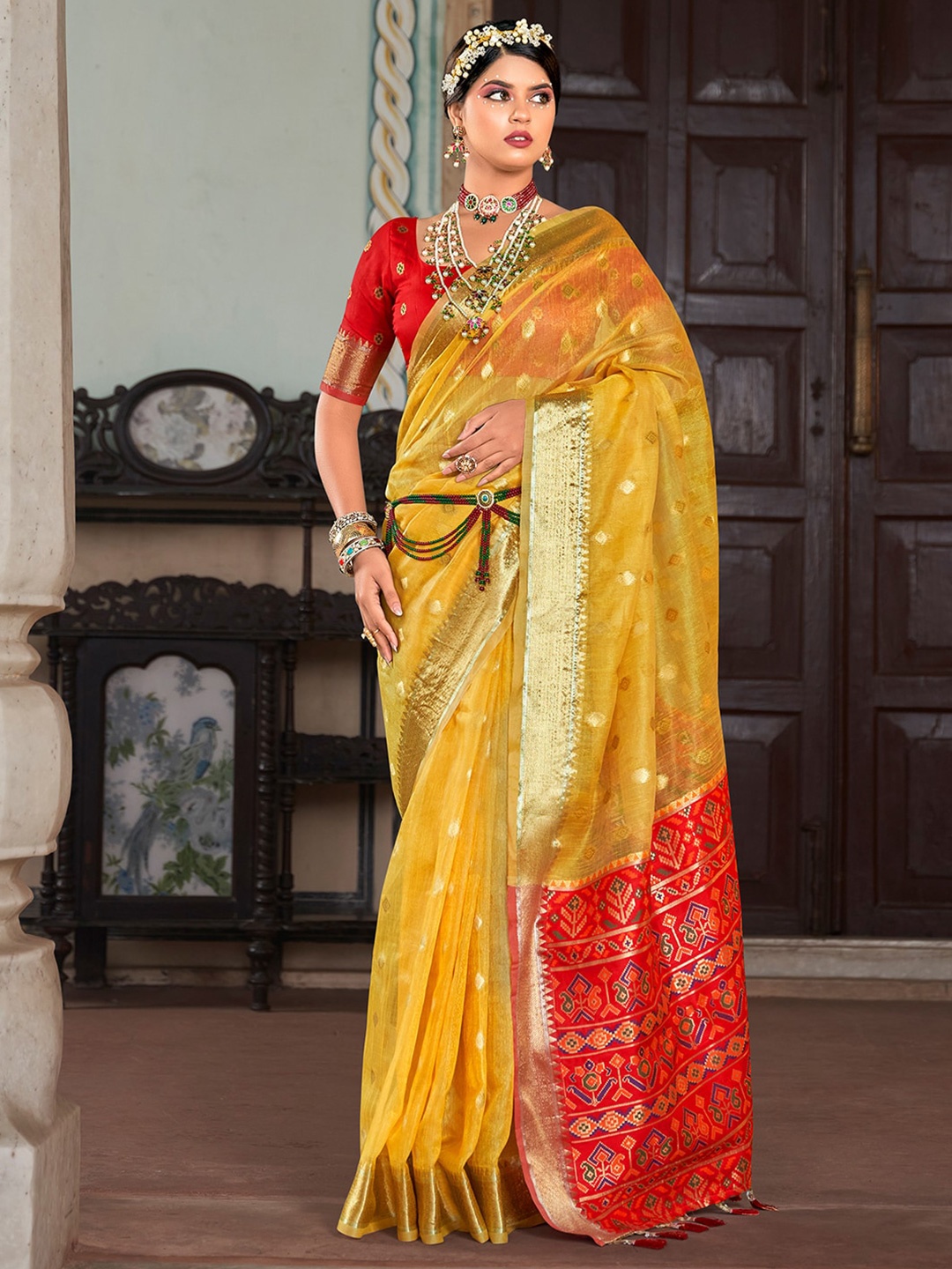 

Satrani Yellow & Red Ethnic Motifs Woven Design Zari Silk Cotton Banarasi Saree