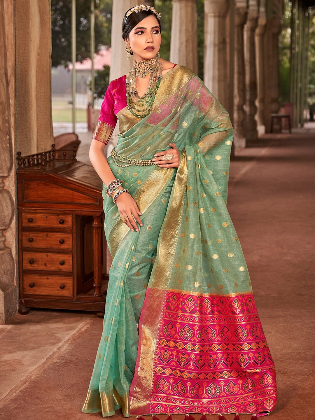 

Satrani Turquoise Blue & Pink Ethnic Motifs Woven Design Zari Silk Cotton Banarasi Saree