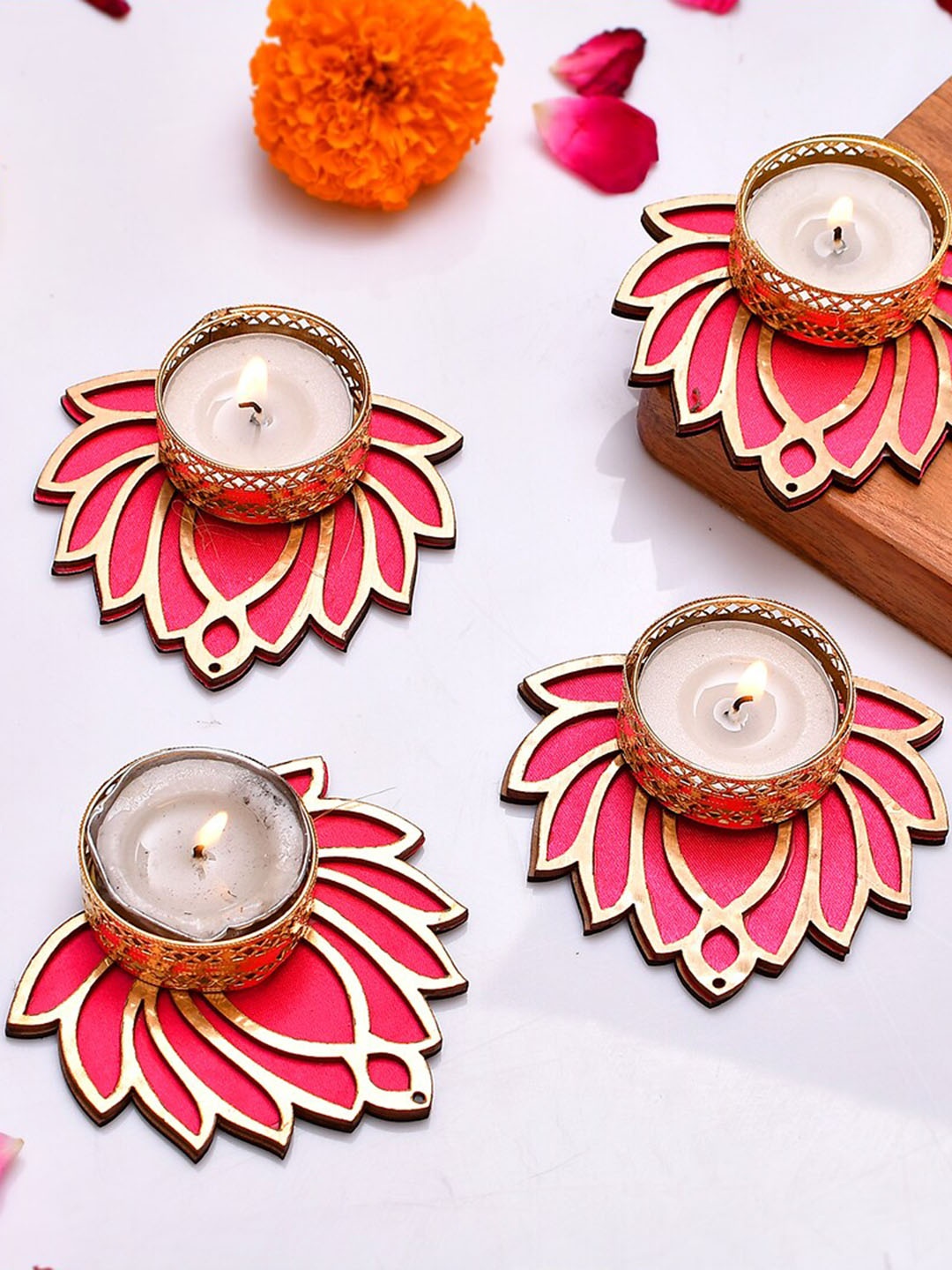 

CraftVatika Pink & Gold Toned 4 Pieces Decoration Candle Holders