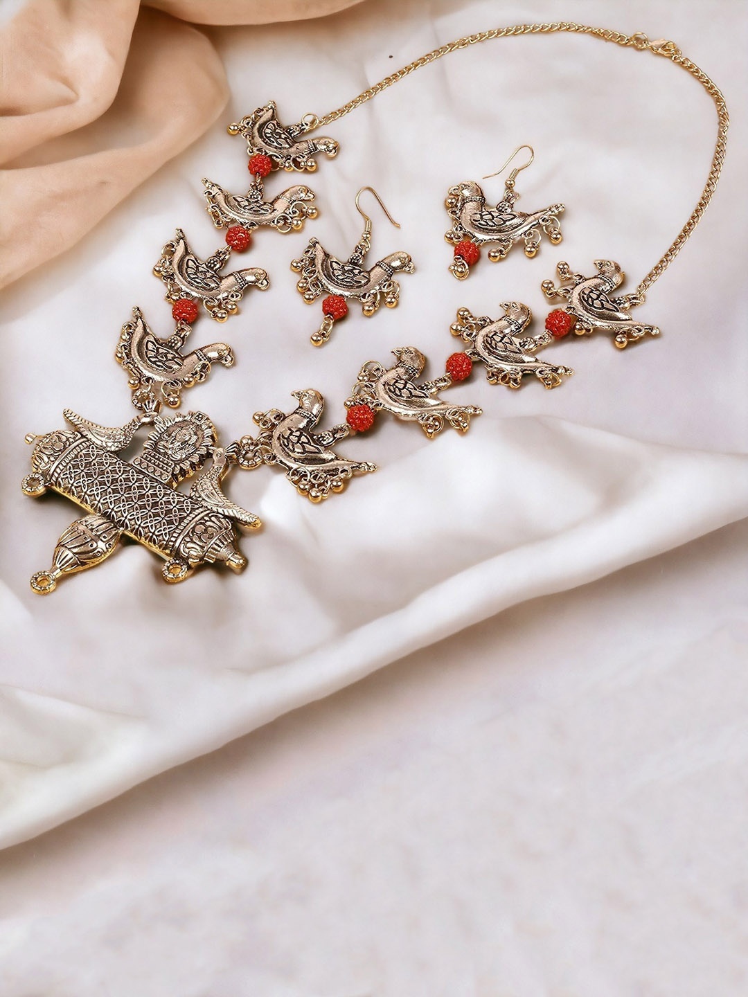 

The Pari Oxidized Silver-Plated Rudraksha Beaded Birds Design Necklace & Earrings