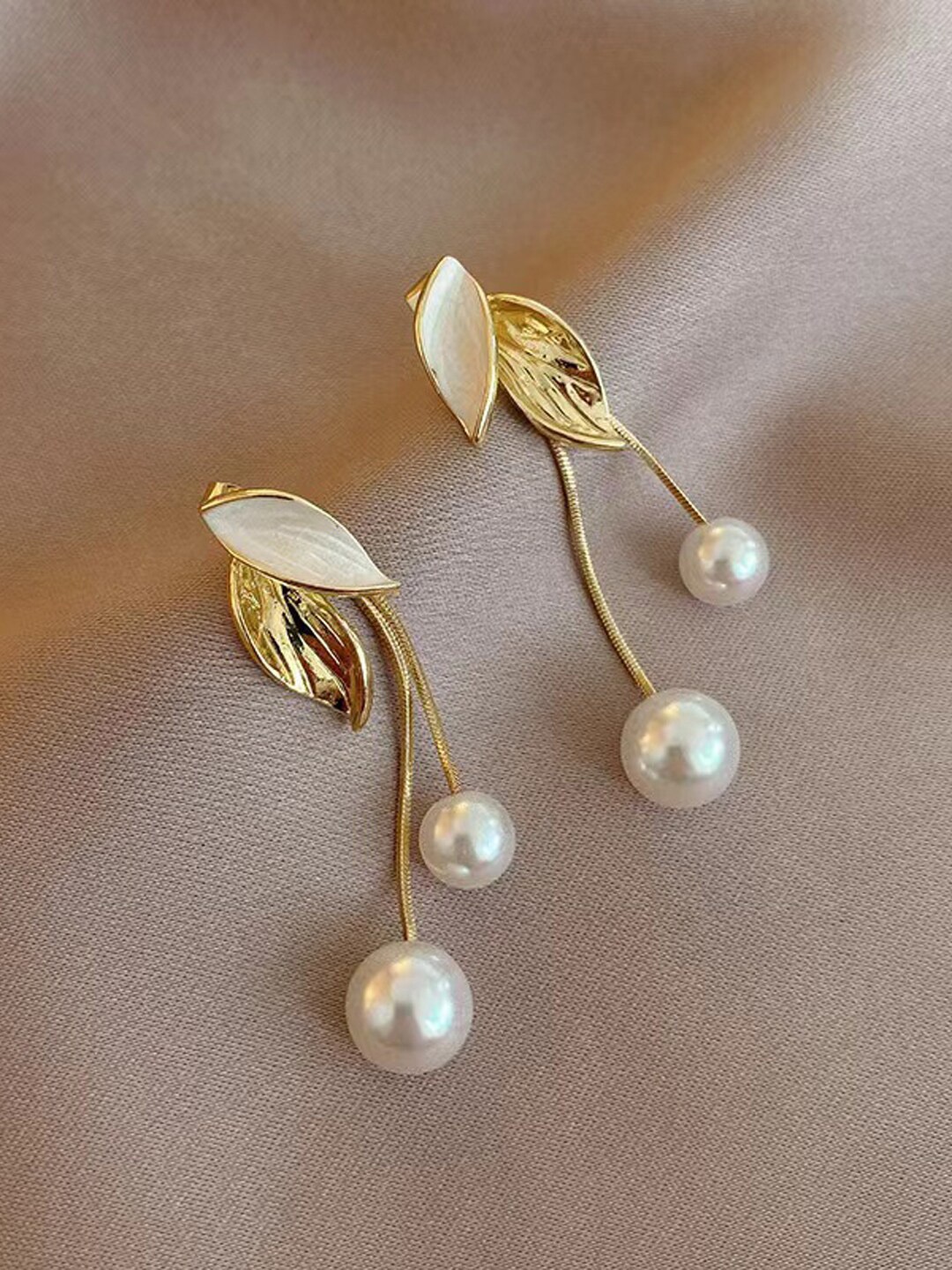 

VAGHBHATT Leaf Shaped Gold-Plated Drop Earrings