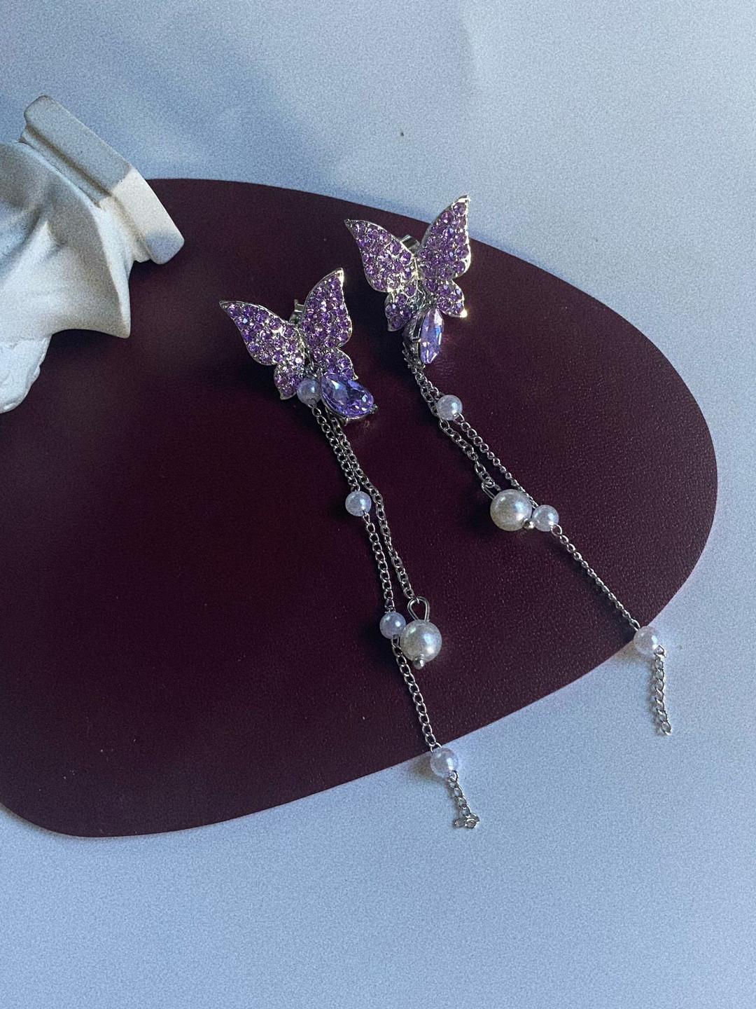 

VAGHBHATT Animal Shaped Silver-Plated Drop Earrings, Purple