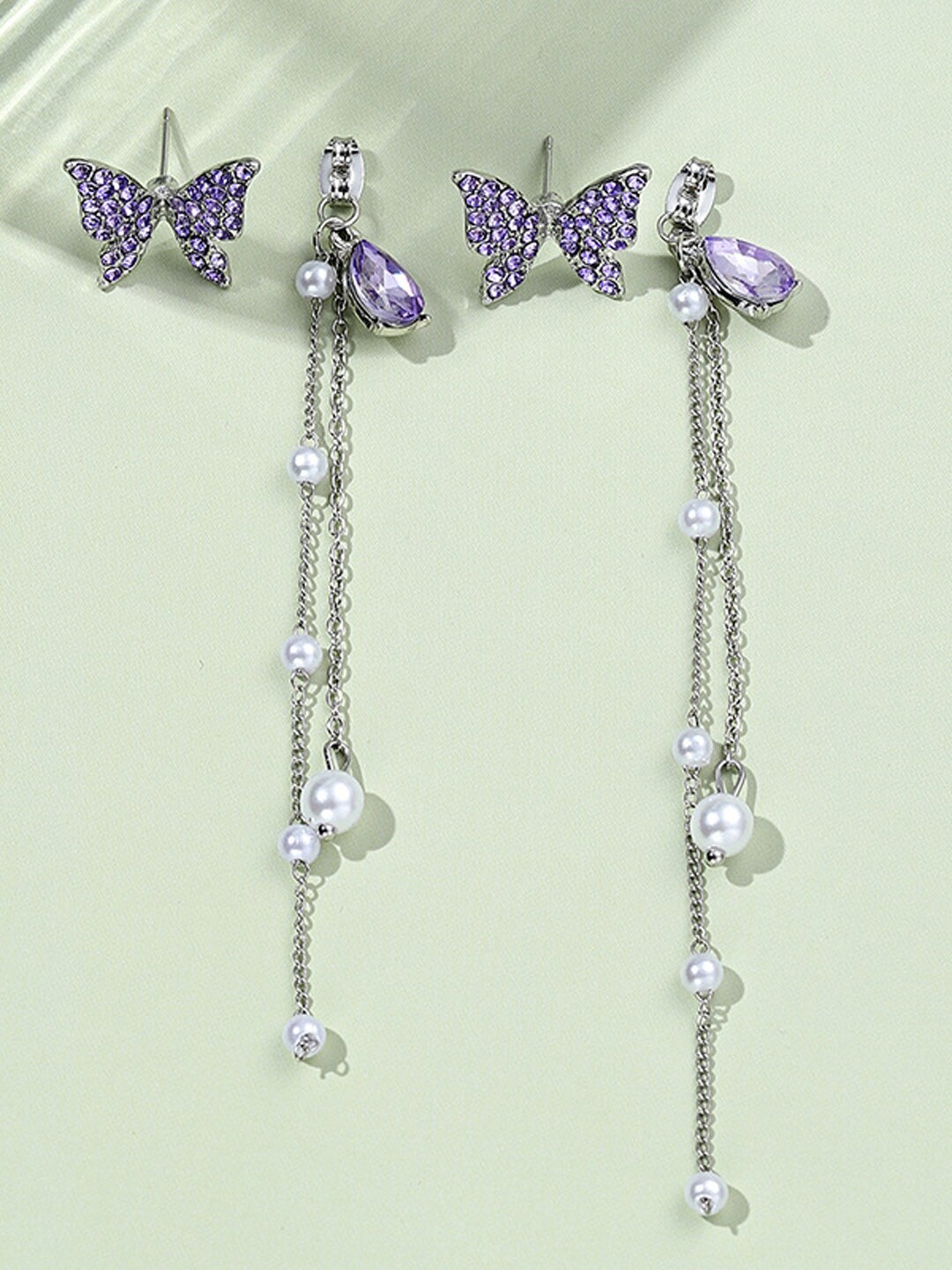 

VAGHBHATT Silver-Plated Butterfly Shaped Rhinestone Studded Tasselled Drop Earrings