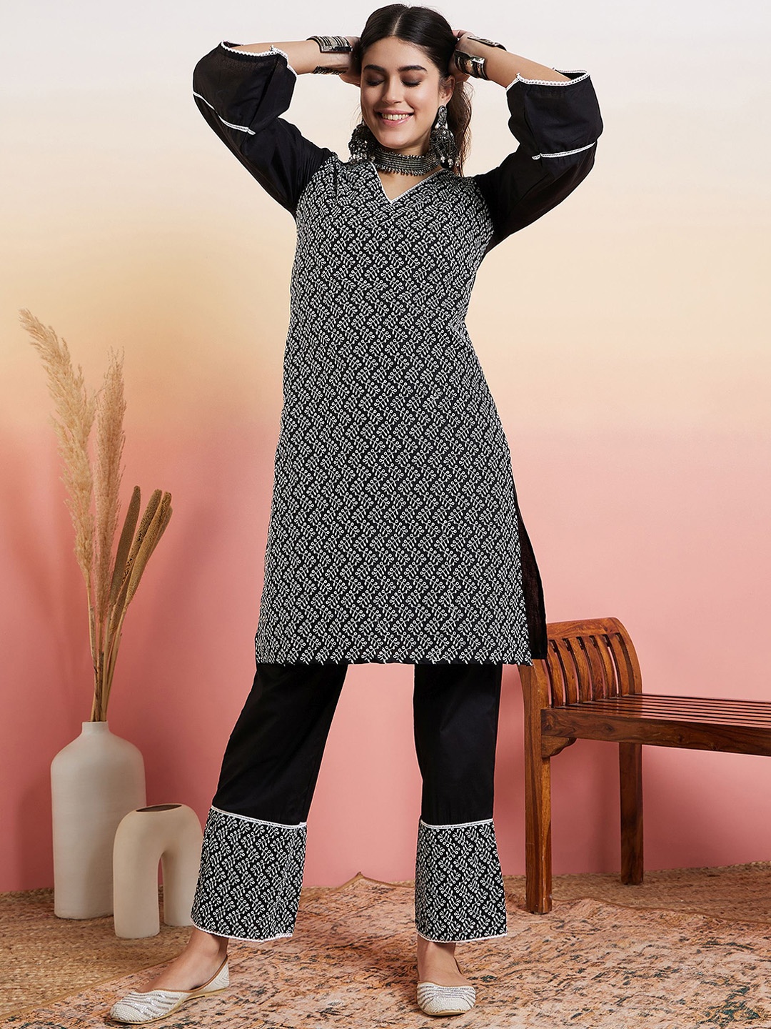 

Inddus Black & White Floral Embroidered Straight Thread Work Kurta With Trouser