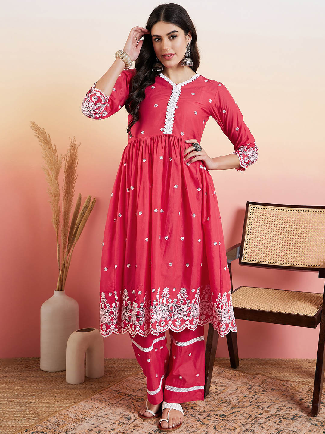 

Inddus Pink & White Floral Embroidered Flared V-Neck Kurta & Palazzo